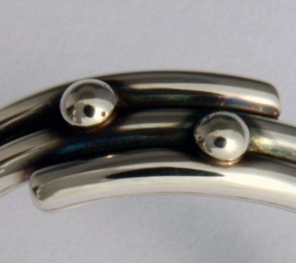 Spiral with two dots, size 9 1/2