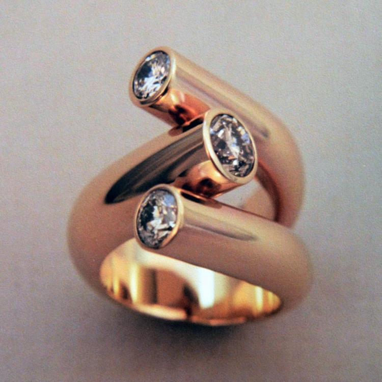 Three Diamond Ring in 14 K. Y.