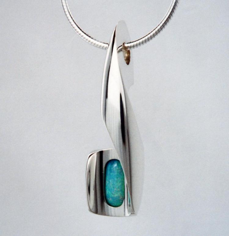 Opal in Carved Setting