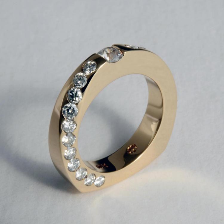 Propeller Design with 23 Diamonds in 14 k. y. gold