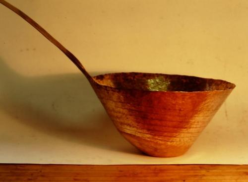 After about 18 courses, the un-hammered lower area of the pitcher (not shiny) is reaching its finished shape.