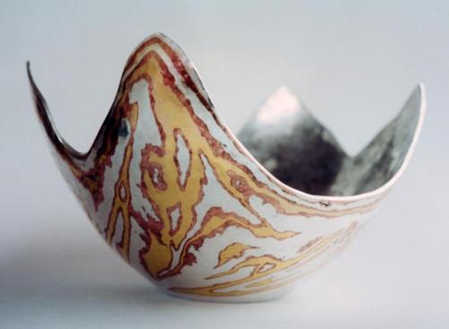 At points of greatest stress, slight de-lamination occurred. These areas were repaired with solder.