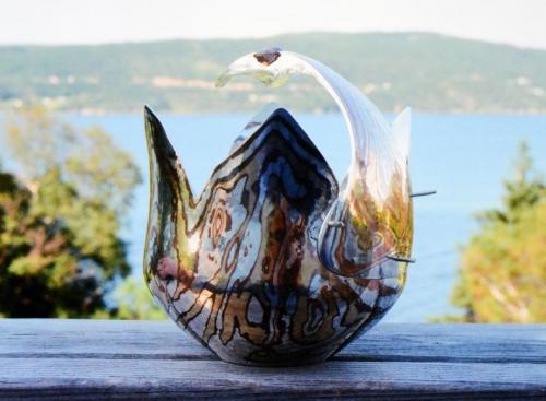 The handle locked in place with wires that will be fashioned into rivets.