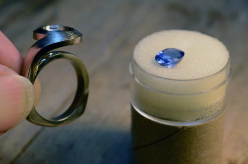 Ring shank is carved back to a square-cornered design, and areas under the stone are pre-polished.