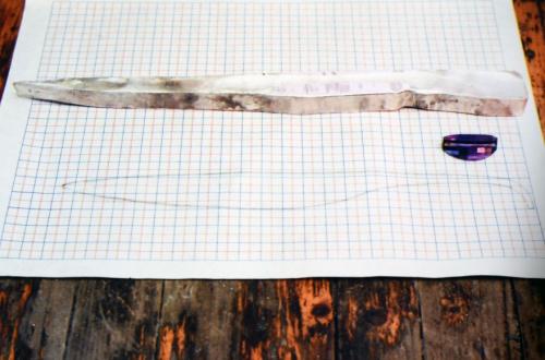 The straightened rod is ready to be forged.