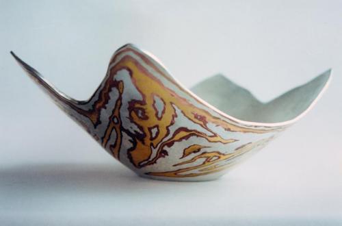 With most of the pattern established, the raising process begins.