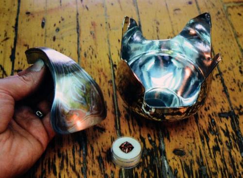 The final shape and pattern of the handle. Layers of sterling silver are soldered under the narrow end for strength and to create sufficient thickness for the stone setting. The sphalerite is also shown.