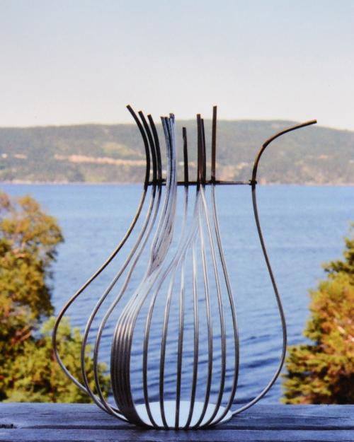 This shows the extent to which a rib-cage-like framework was built before beginning to fill in a solid surface. Medium silver solder was used throughout.