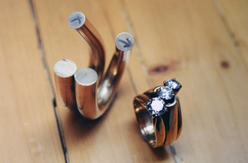 Two halves bent further around.