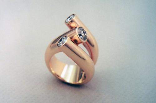 The finished piece. The diamonds are set, and all surfaces are smoothed and polished.