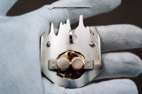 The assembly ready to be riveted in place. Sterling circles behind the stones were bezel set from the back to lock the stones in place.
