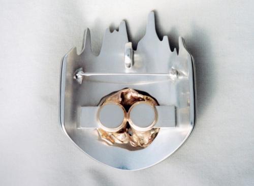 The finished back, riveted and cleaned up, and the brooch pin riveted into its hinge end.