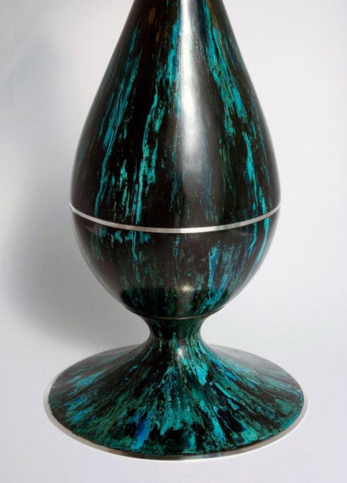 A detail of the patina which is the result of coating the piece with vinegar and exposing it for 12 hours to an atmosphere of ammonia fumes.