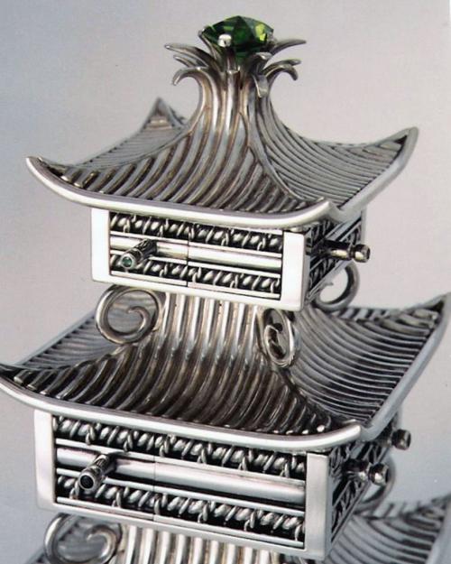 A detail of the finished piece. The gemstone at the apex is a pagoda-cut peridot — literally, the girdle of the stone angles up at the corners and the prongs are attached at the lowest points along the edge.