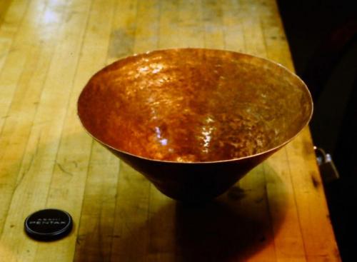 At least 10 courses of raising. The rounded bottom of the vase is just beginning to take shape.