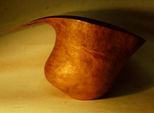 Very gradually the area under the handle is brought in.