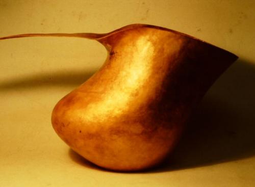 The final contour under the handle. The shiny metal in the tightest area of curve shows where the metal has been carefully hammered.