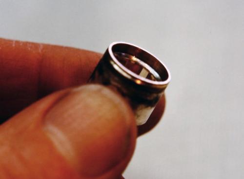 The two cylinders are soldered together. The beveled seat for the stone can be seen inside.