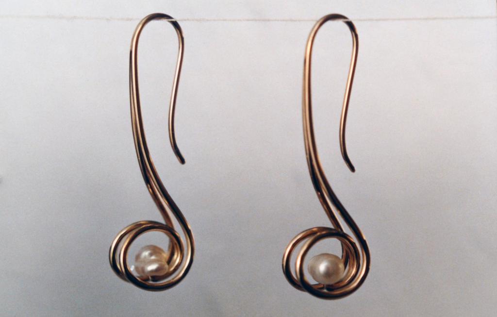 Pearls in 14 k. y. Crook-style spirals