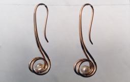 Pearls in 14 k. y. Crook-style spirals