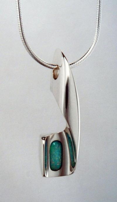 Opal in Carved Setting
