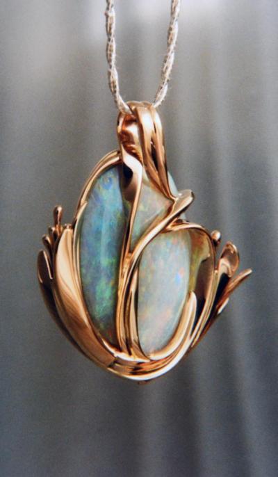 Australian Opal in 14 k. y. Floral Setting